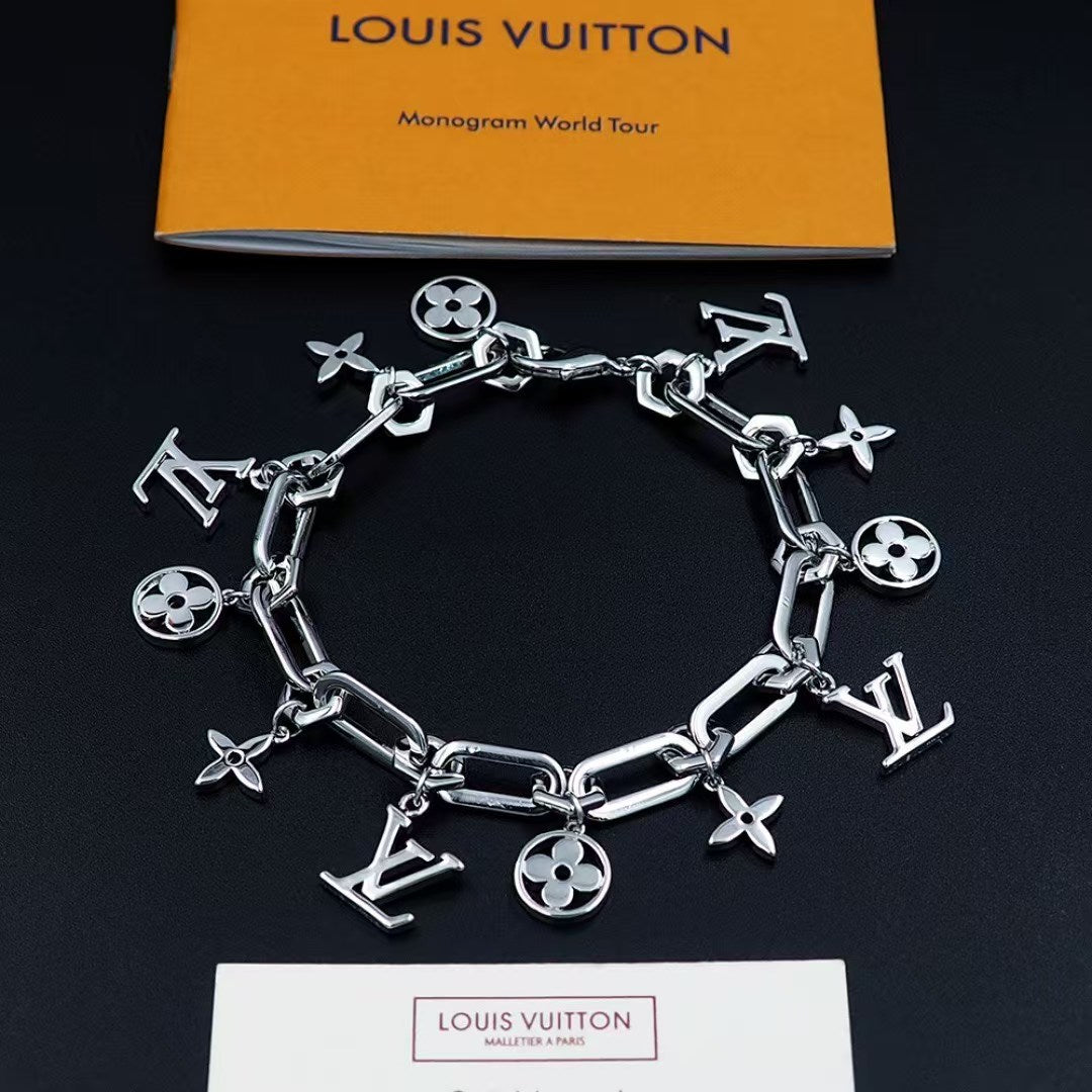 Louis Vuitton Charm Bracelet Duo – Silver & Gold Chains with LV Monogram & Floral Motifs