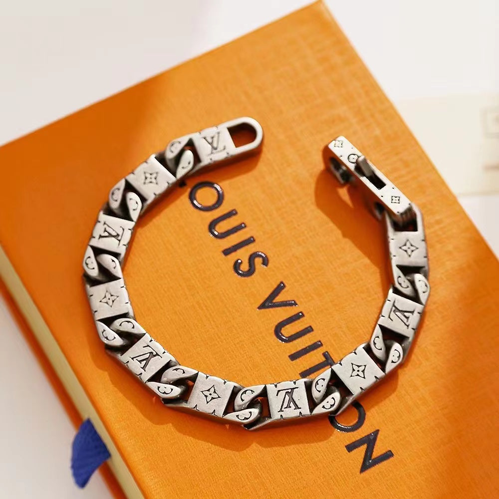 Louis Vuitton Silver Link Jewelry Set – Engraved Necklace & Bracelet with Monogram and Iconic Motifs