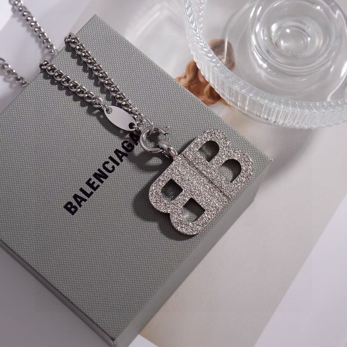Balenciaga BB Logo Necklace Collection – Crystal-Encrusted Pendants in Silver & Gold