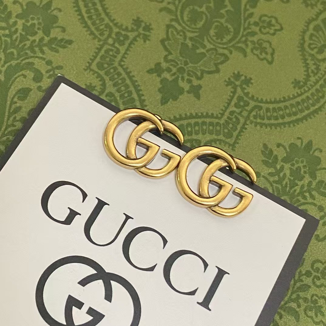 Gucci GG Logo Stud Earrings – Gold-Tone Interlocking GG Emblem