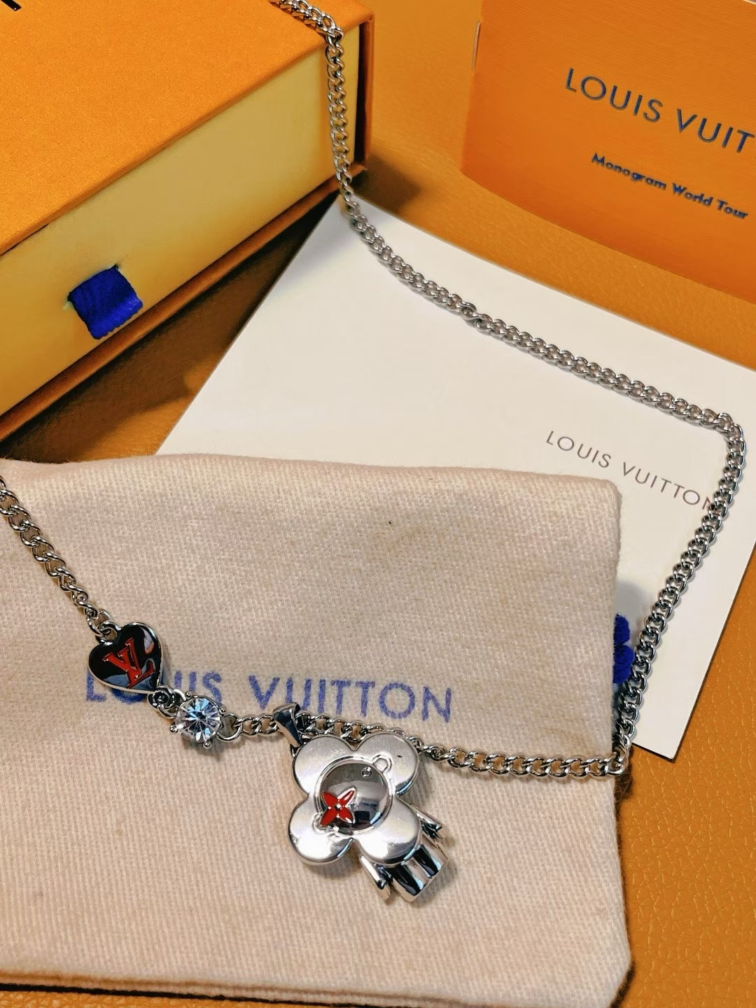 Louis Vuitton Heart & Character Charm Necklace – Silver Chain with Iconic Motifs