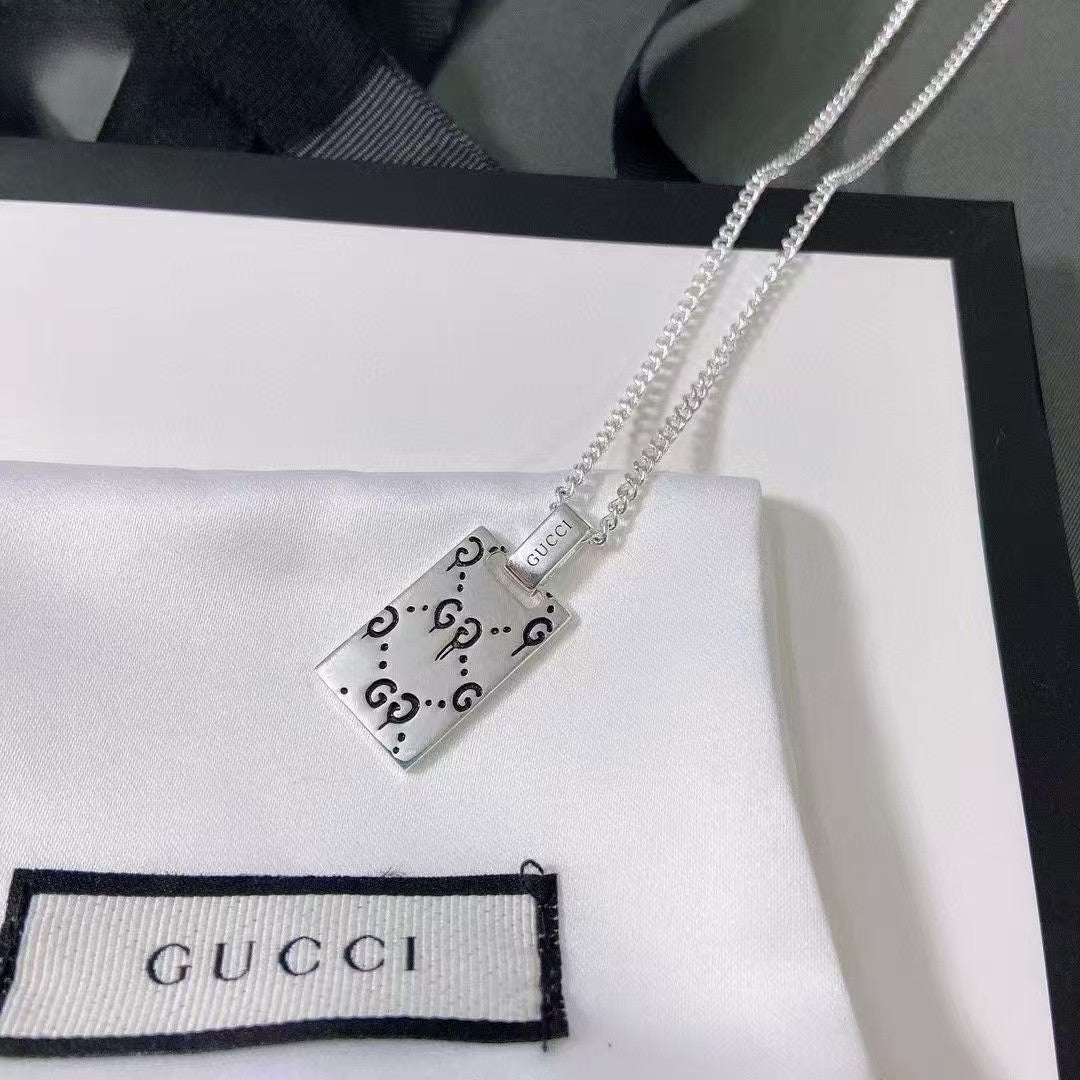 Gucci Ghost Pendant Necklace & Bracelet Set – Sterling Silver with Musical Motif