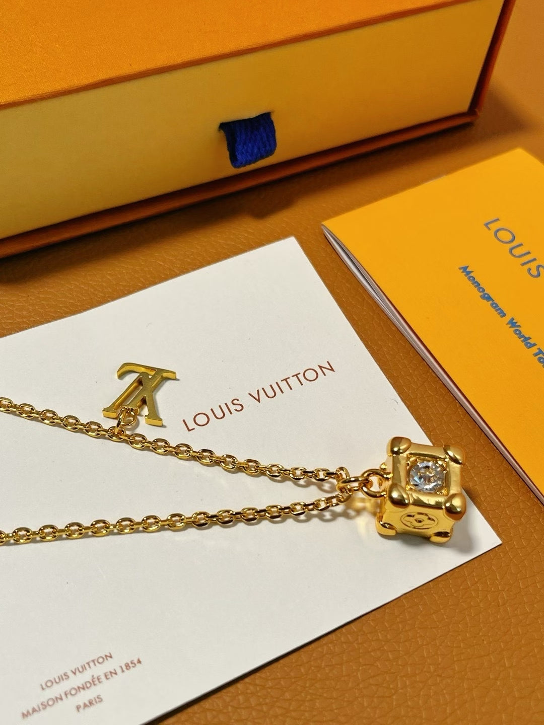 Louis Vuitton Cube & Logo Pendant Necklace – Gold-Tone with Monogram Detailing