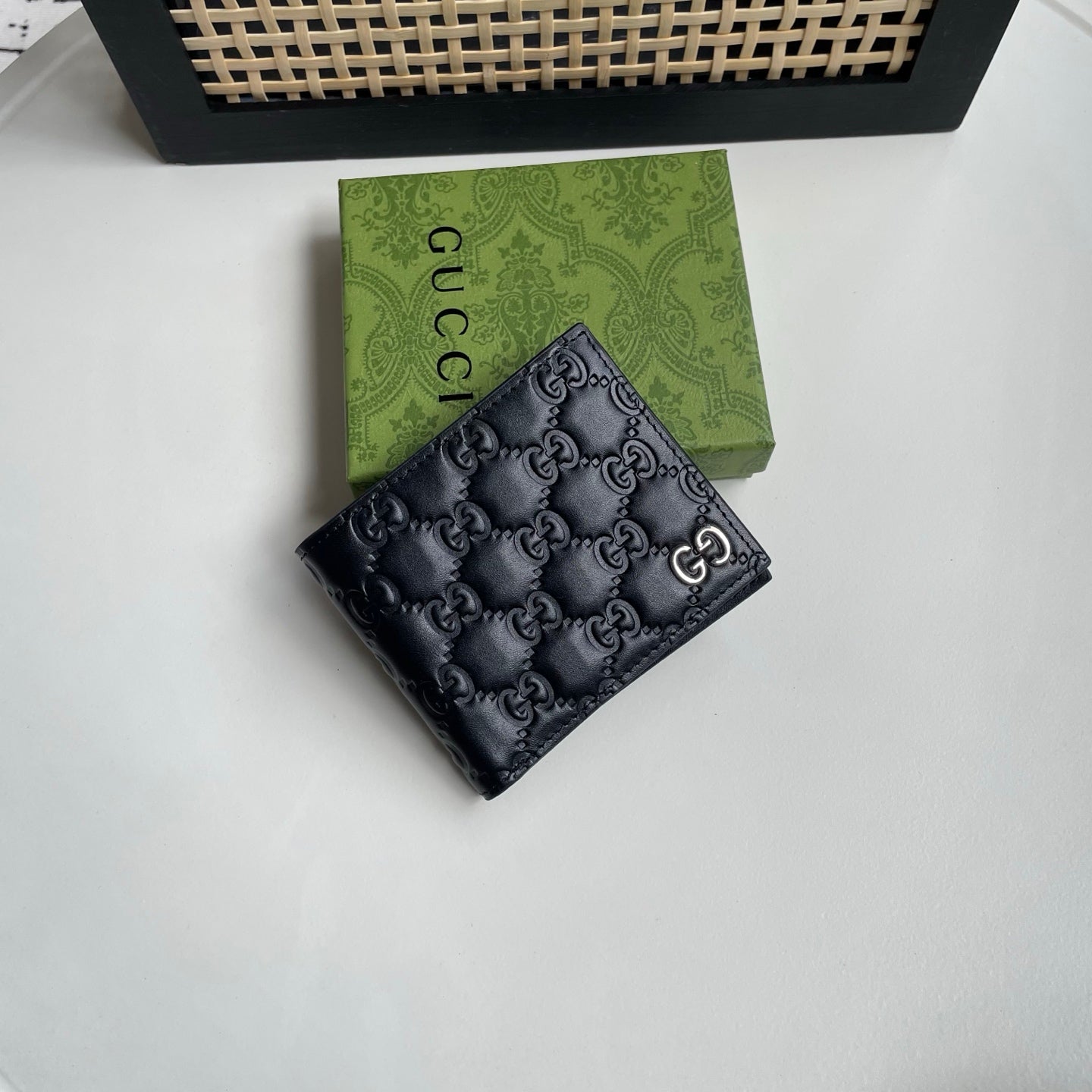 Gucci Black GG Embossed Wallet – Gold Monogram Emblem Edition