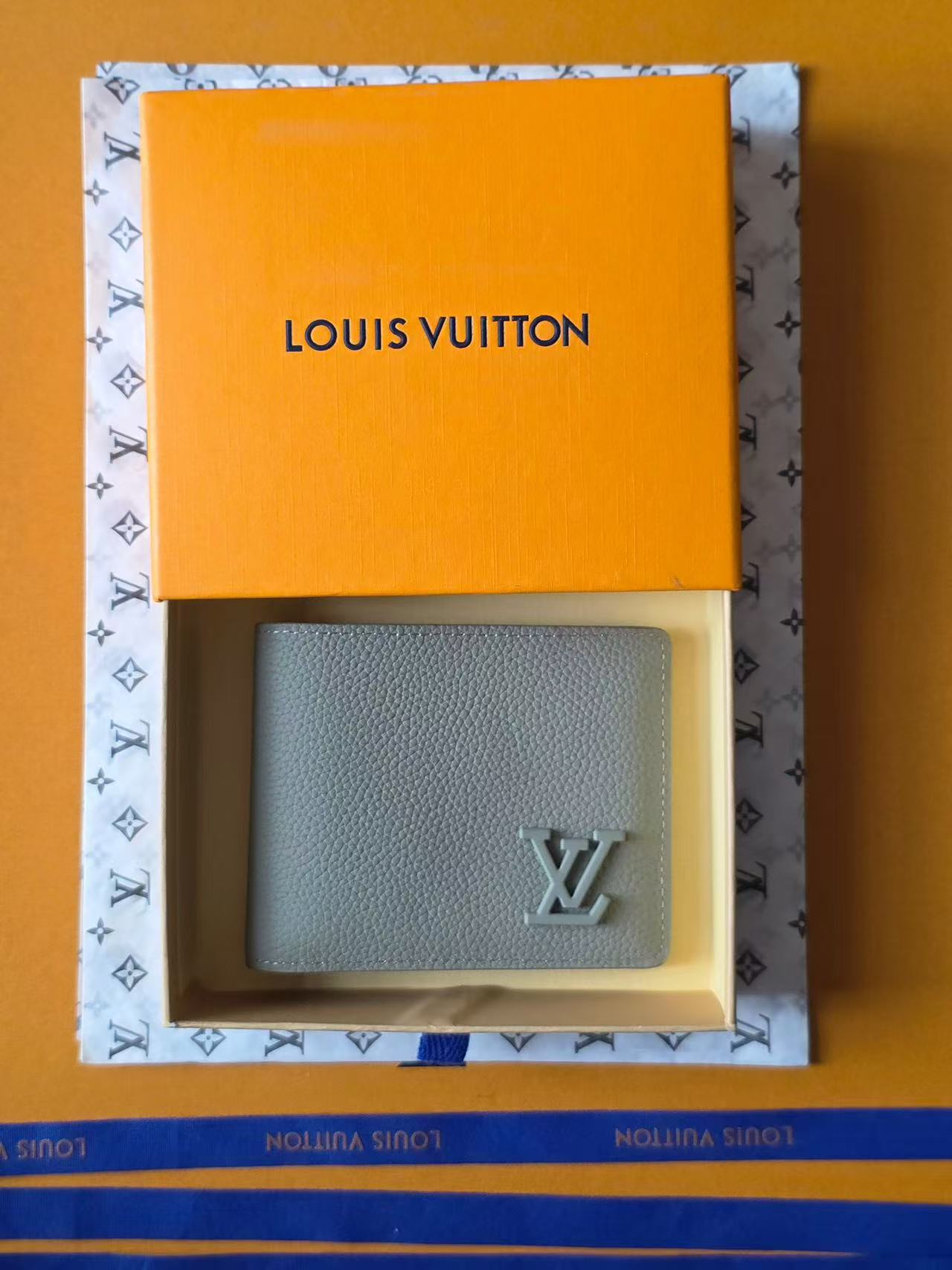 Louis Vuitton Textured Leather Wallets