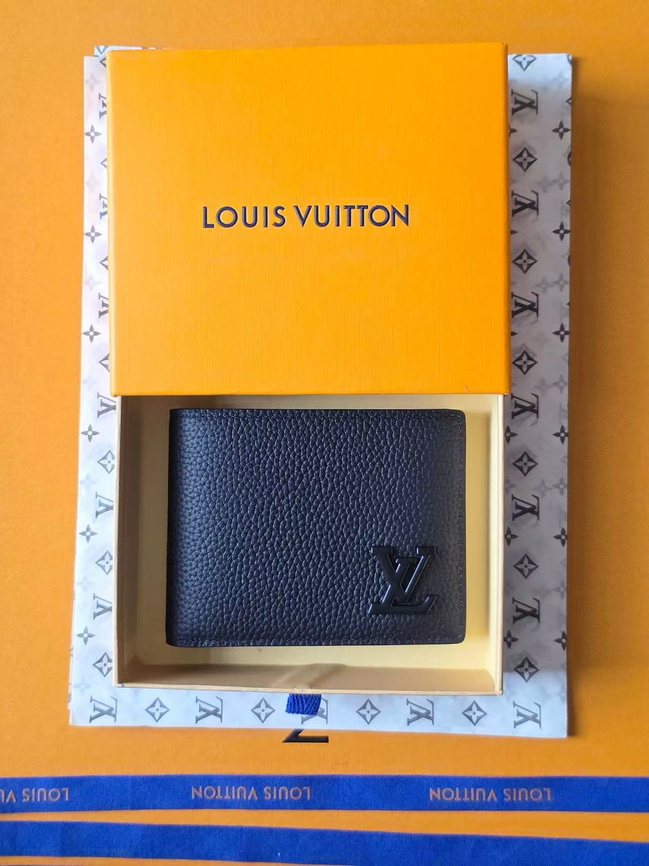 Louis Vuitton Textured Leather Wallets