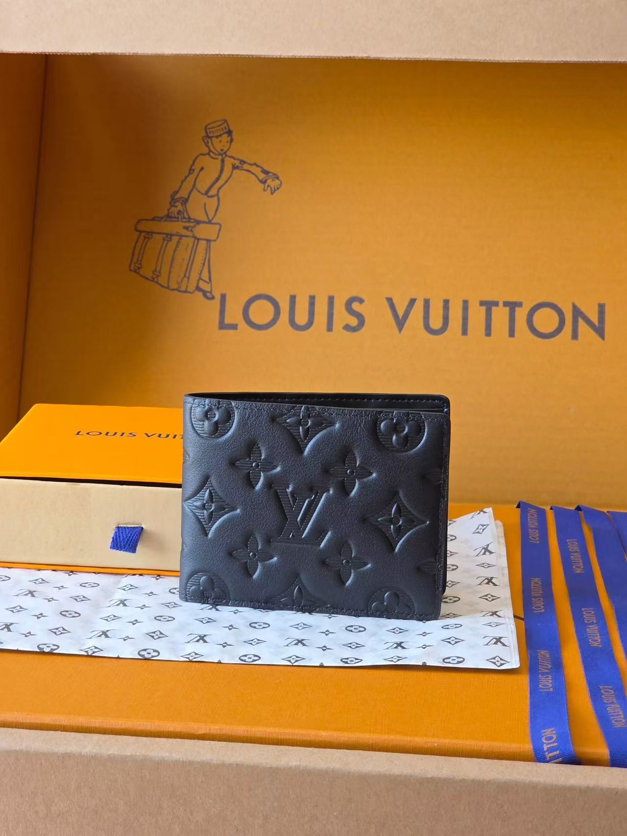 Louis Vuitton Embossed Wallet Collection