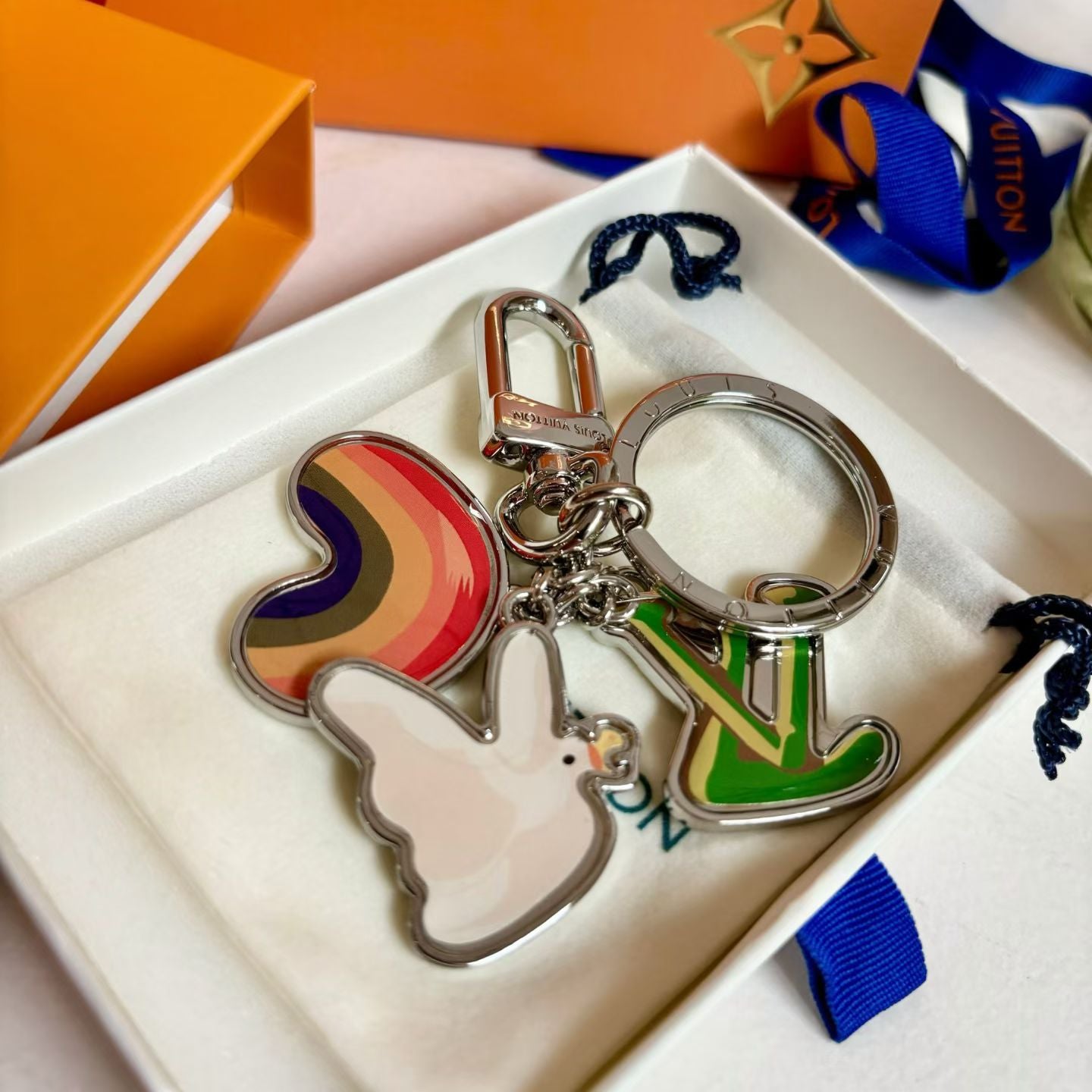 Louis Vuitton Rainbow Dove Keychain – Multicolor Charms with LV Logo