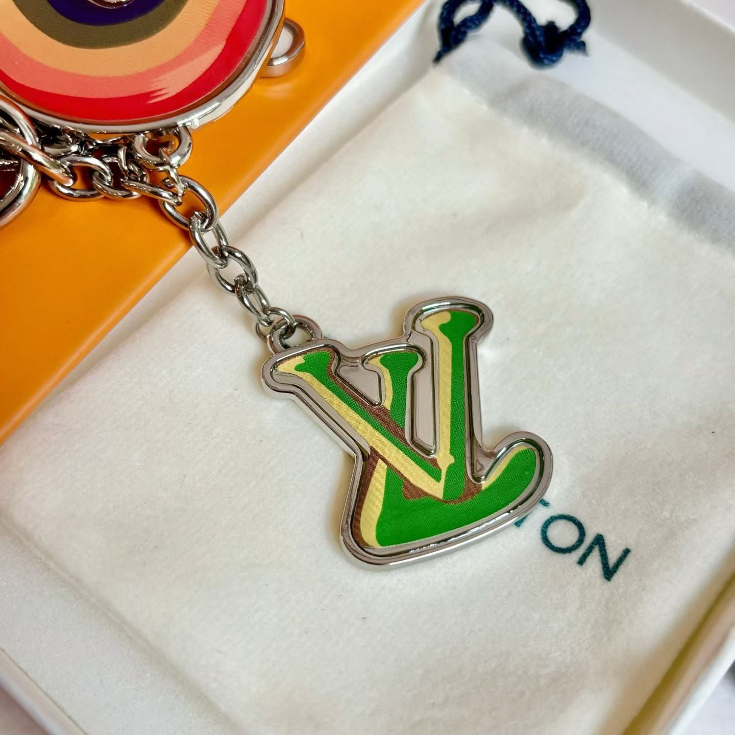 Louis Vuitton Rainbow Dove Keychain – Multicolor Charms with LV Logo