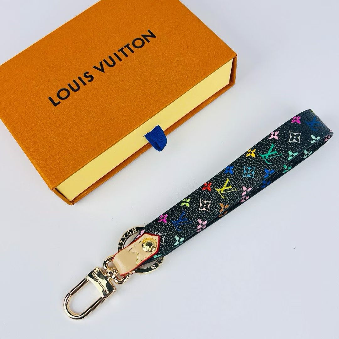 Louis Vuitton Monogram Wristlet Strap – Iconic Patterns & Gold-Toned Clasps