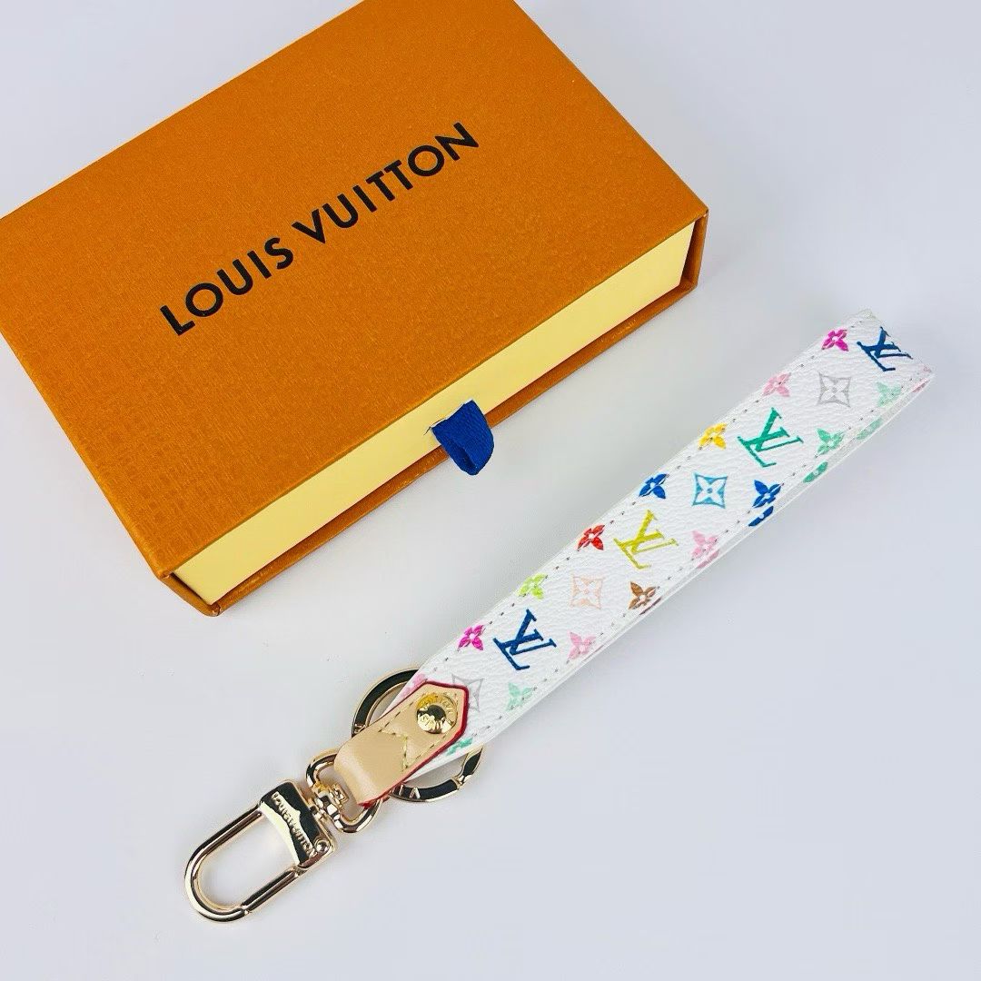 Louis Vuitton Monogram Wristlet Strap – Iconic Patterns & Gold-Toned Clasps