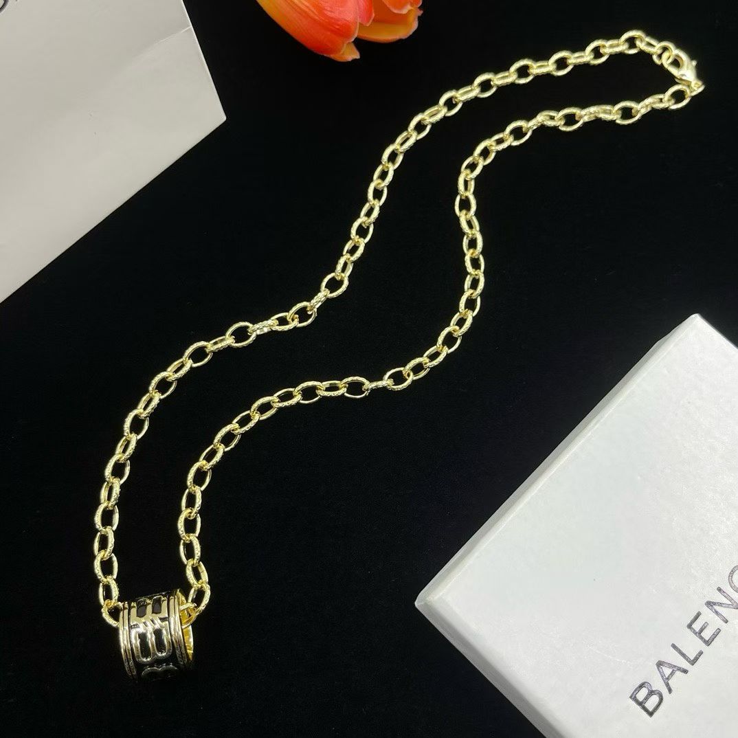 Balenciaga Cylinder Pendant Necklace – Gold & Silver Variants