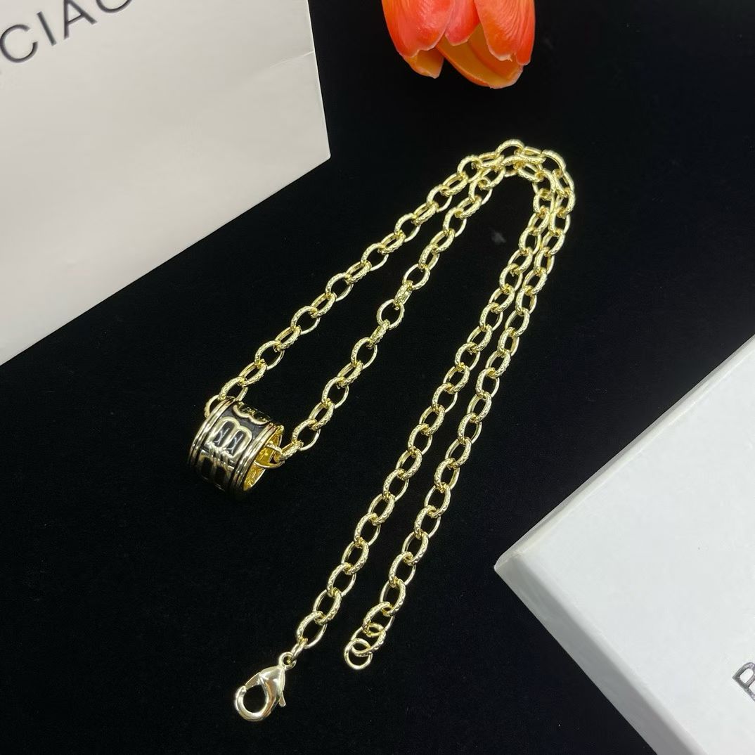Balenciaga Cylinder Pendant Necklace – Gold & Silver Variants
