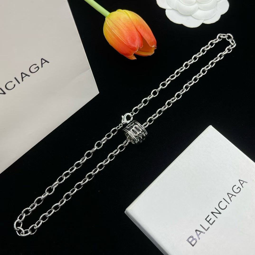 Balenciaga Cylinder Pendant Necklace – Gold & Silver Variants