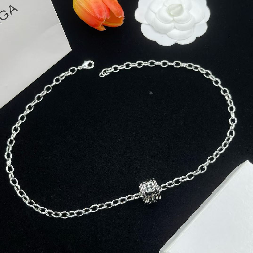 Balenciaga Cylinder Pendant Necklace – Gold & Silver Variants