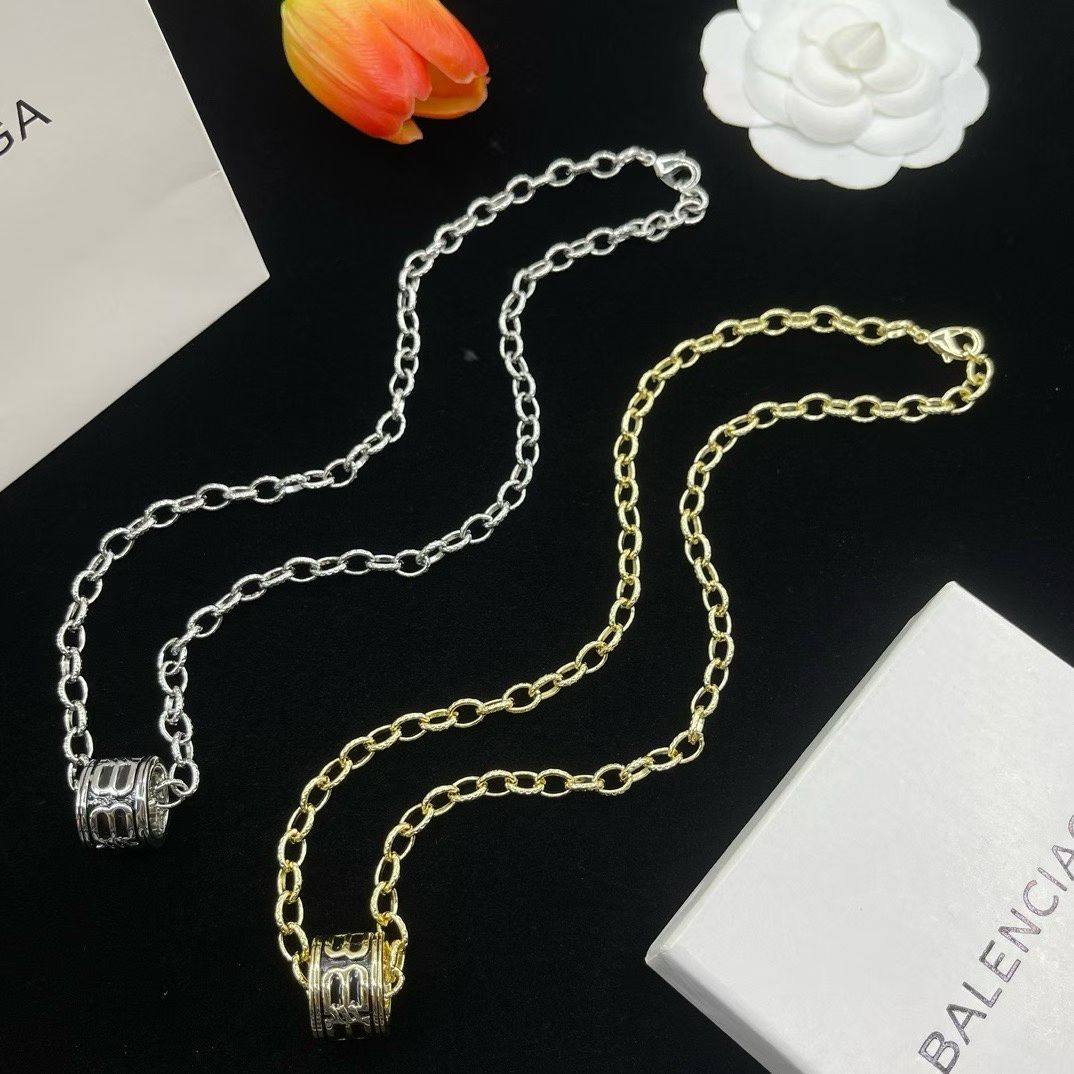 Balenciaga Cylinder Pendant Necklace – Gold & Silver Variants