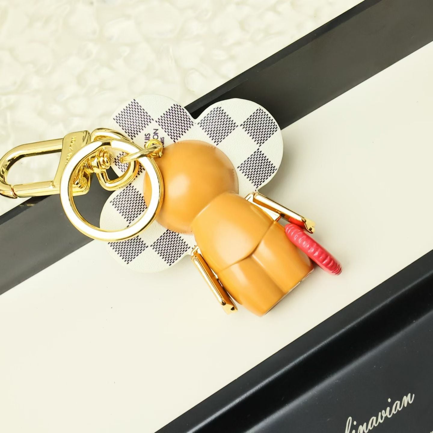 Louis Vuitton Flower Character Keychain – Checkered Petals & Red Wheels