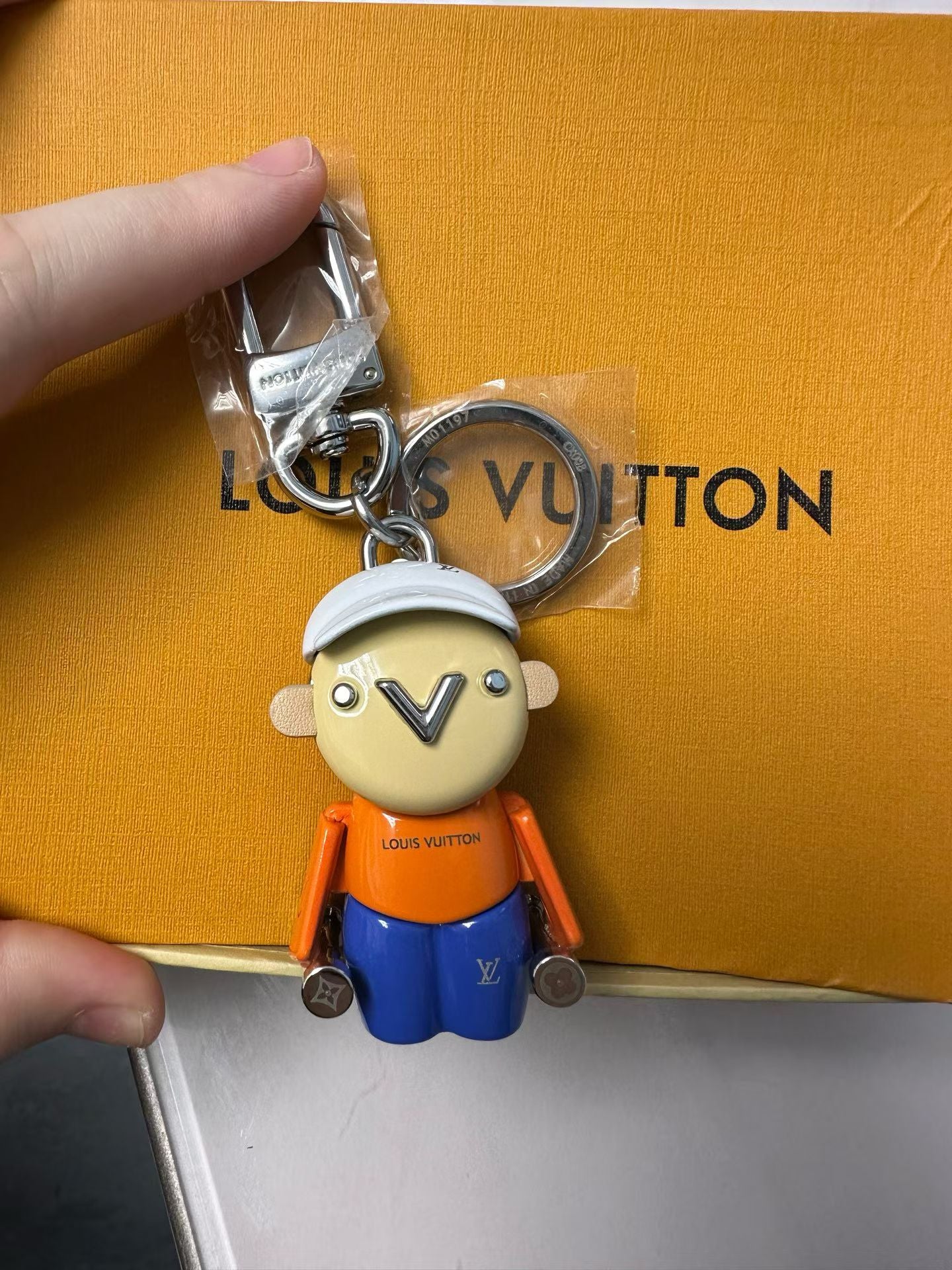 Louis Vuitton Street Style Character Keychain – White Cap, Orange Shirt & Blue Pants