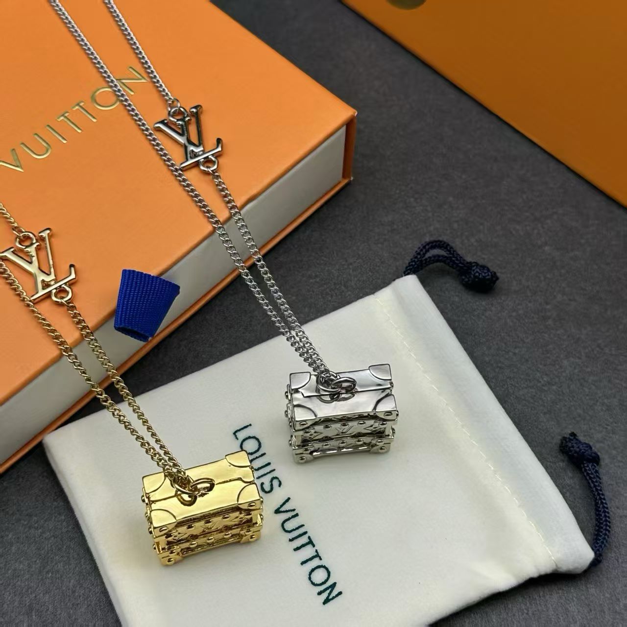 Louis Vuitton Mini Trunk Pendant Necklace – Gold & Silver Variants