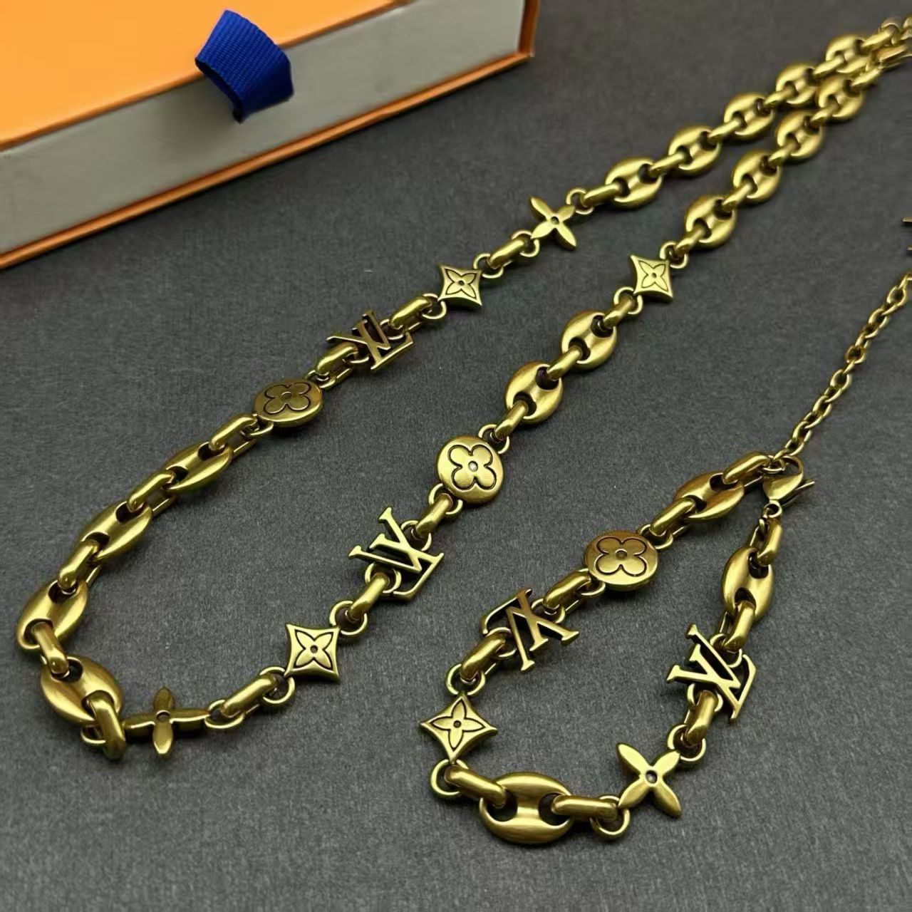 Louis Vuitton Monogram Jewelry Set – Silver Necklace & Bracelet with LV Logo & Floral Motifs