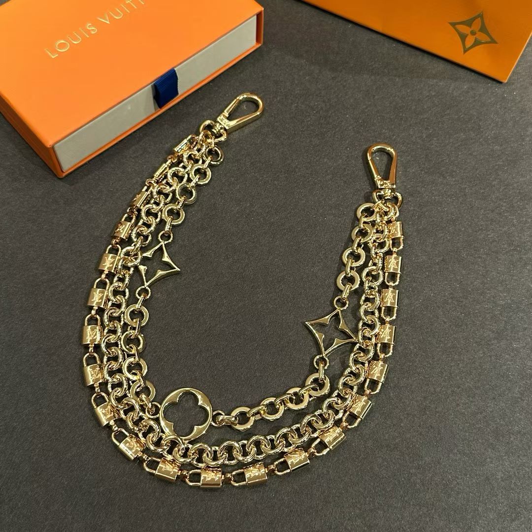 Louis Vuitton Triple-Strand Monogram Chain – Gold-Toned with Floral & Star Charms