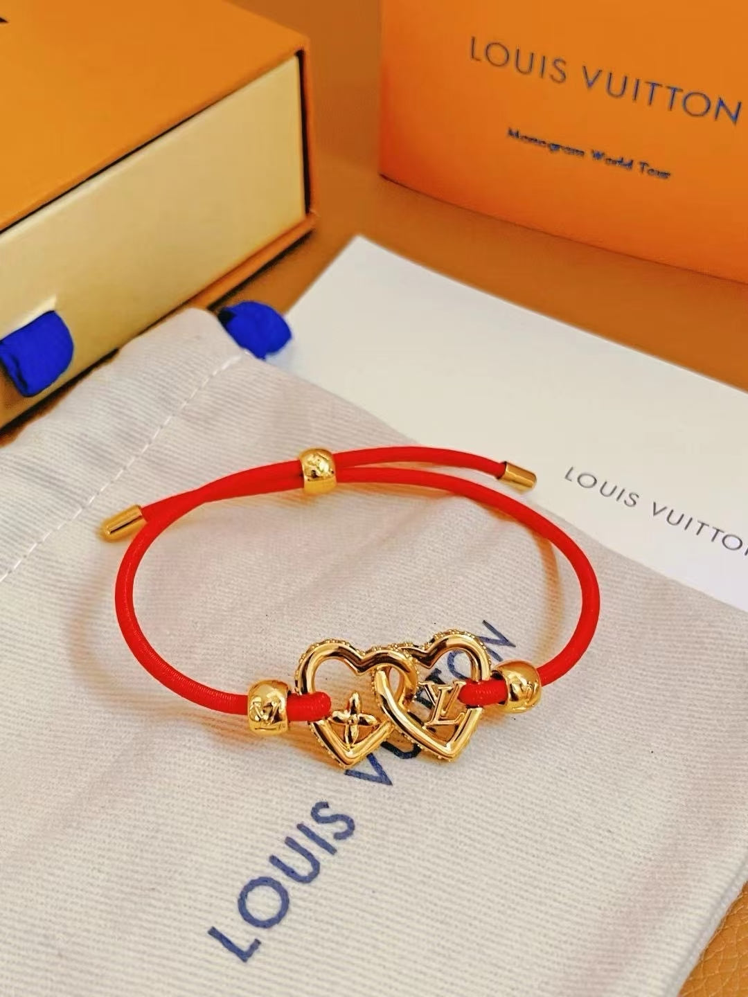 Louis Vuitton Interlocking Heart Cord Bracelet – Black, Red, Blue & Orange