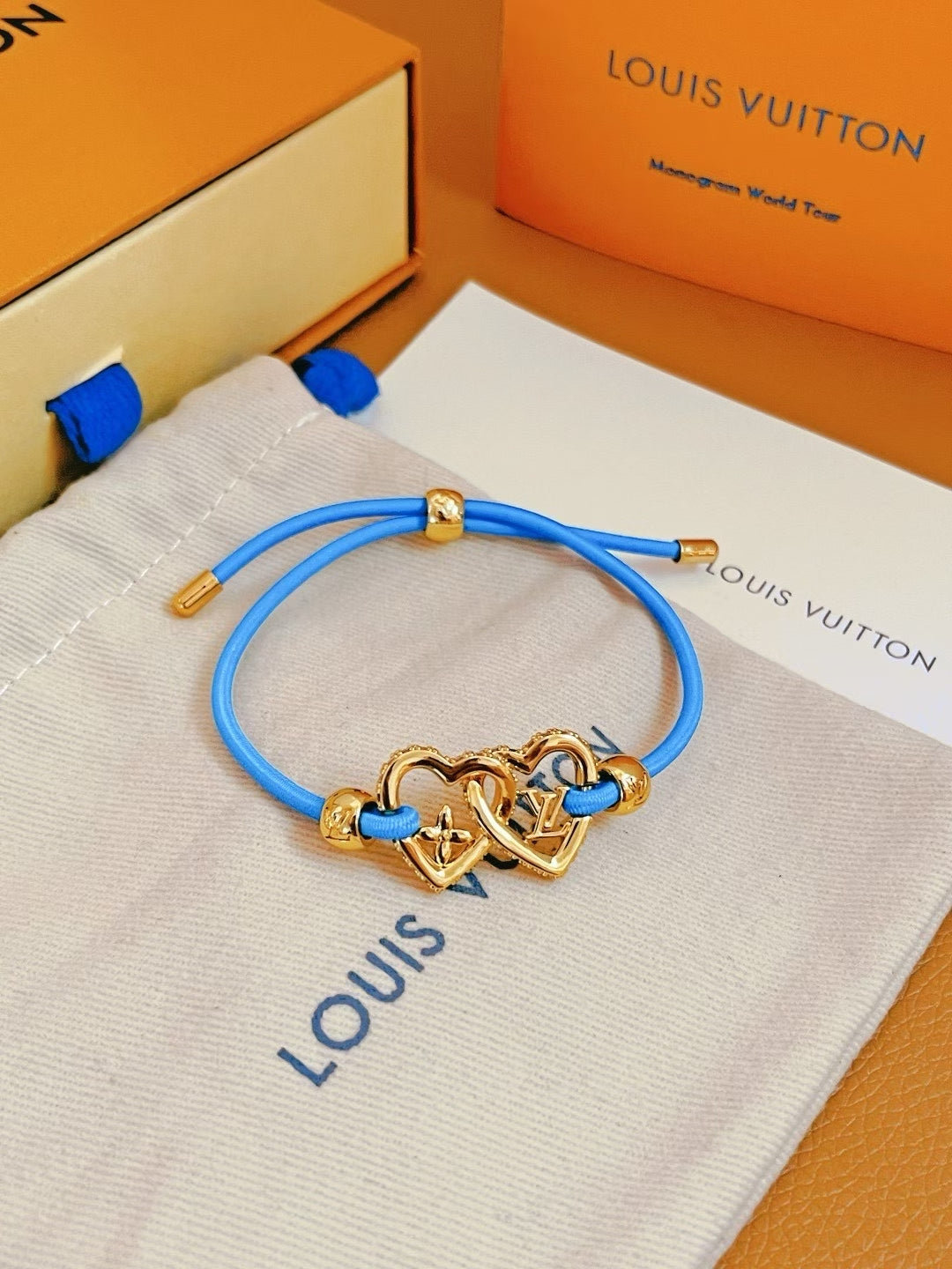 Louis Vuitton Interlocking Heart Cord Bracelet – Black, Red, Blue & Orange