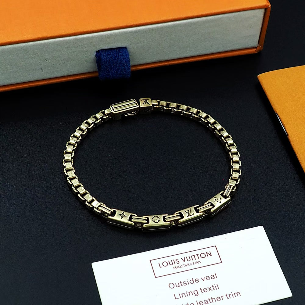 Louis Vuitton Gold Chain Bracelet – Monogram Engraving & Signature Clasp
