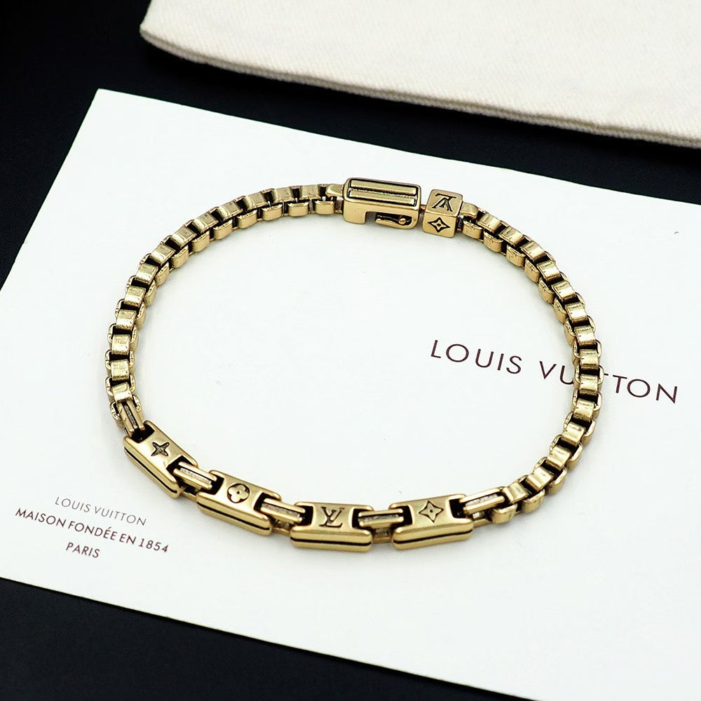 Louis Vuitton Gold Chain Bracelet – Monogram Engraving & Signature Clasp