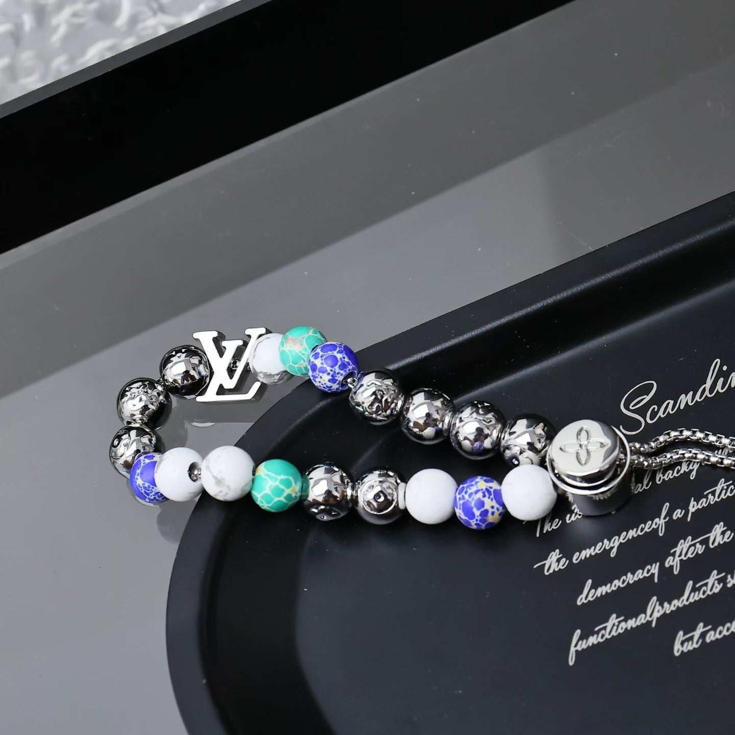 Louis Vuitton Multicolor Beaded Bracelet – Metallic & Patterned Beads with Sliding Clasp