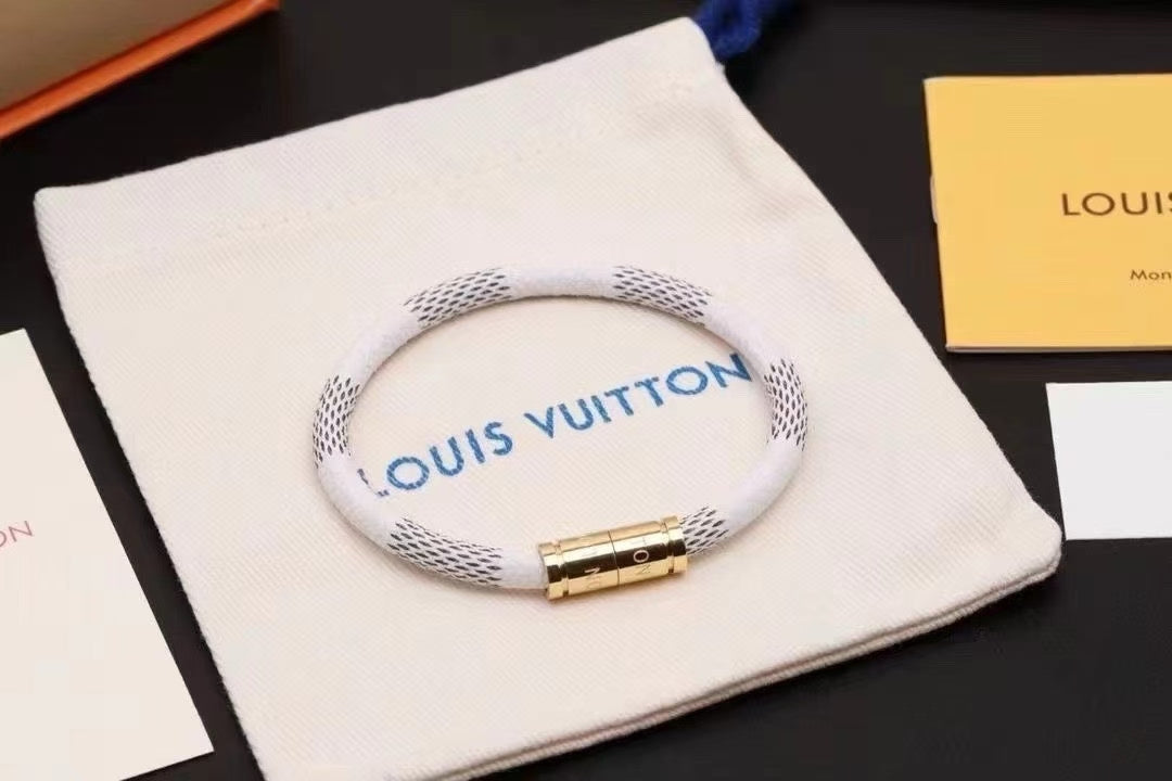 Louis Vuitton White Mesh Bracelet – Black Pattern & Gold Clasp