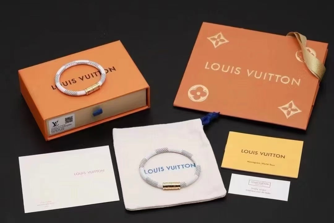 Louis Vuitton White Mesh Bracelet – Black Pattern & Gold Clasp
