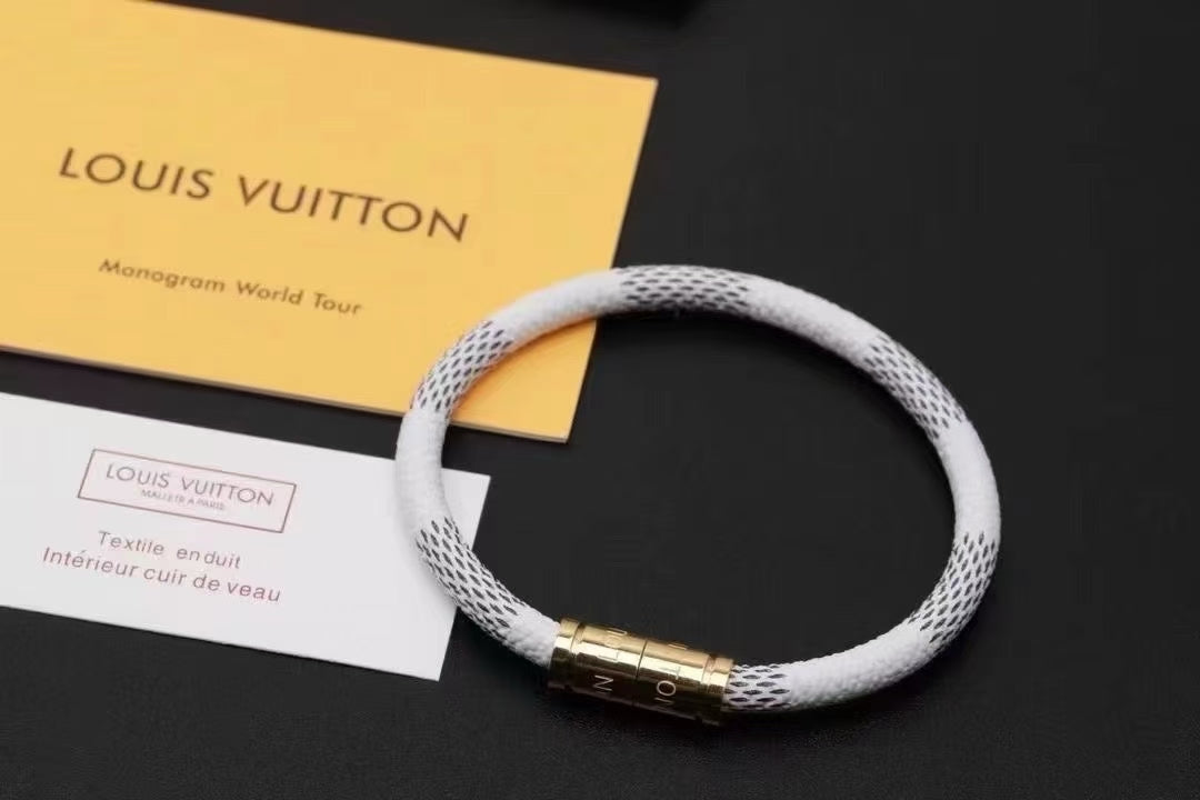 Louis Vuitton White Mesh Bracelet – Black Pattern & Gold Clasp