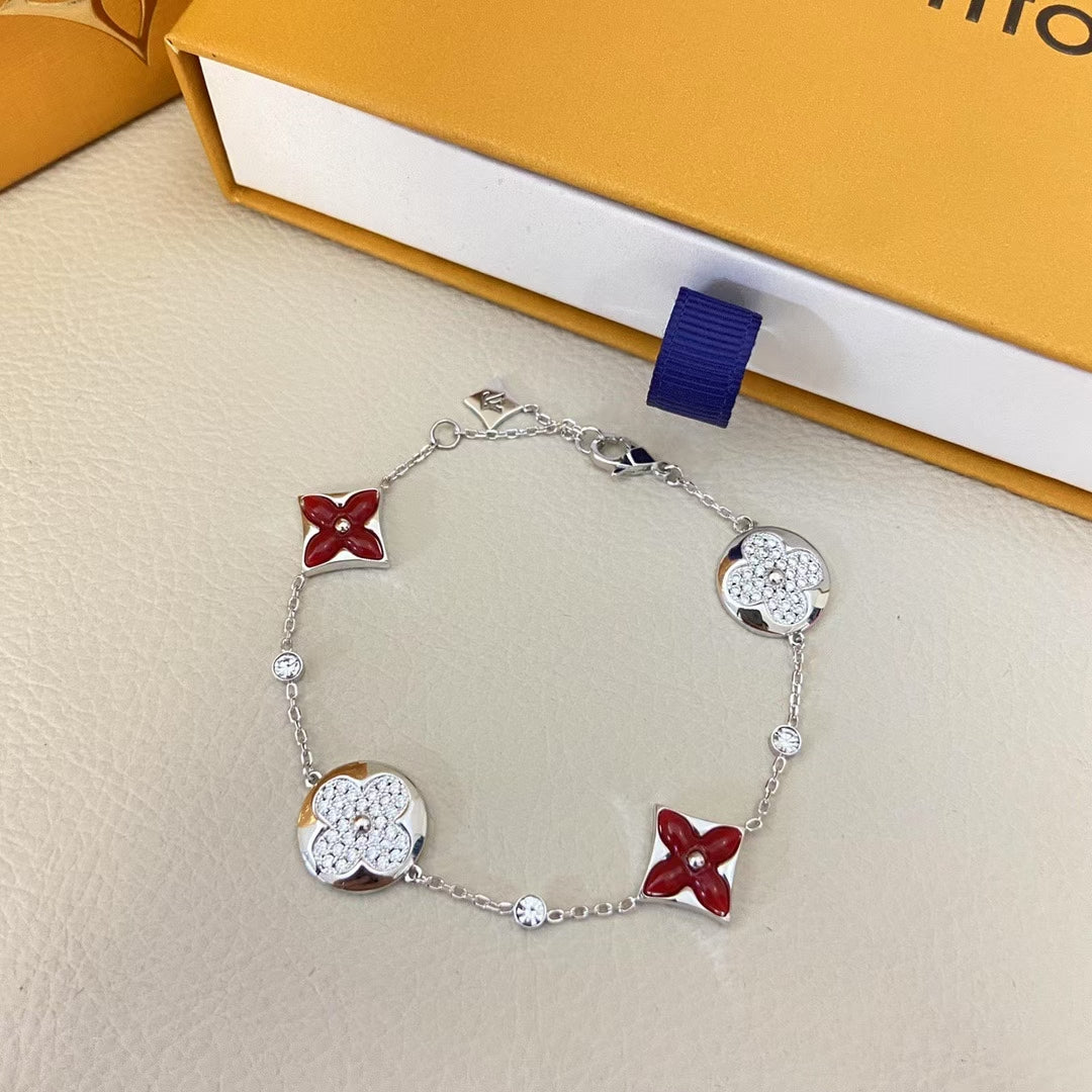 Louis Vuitton Red & Gold Floral Bracelet – Sparkling Stones & Monogram Motifs