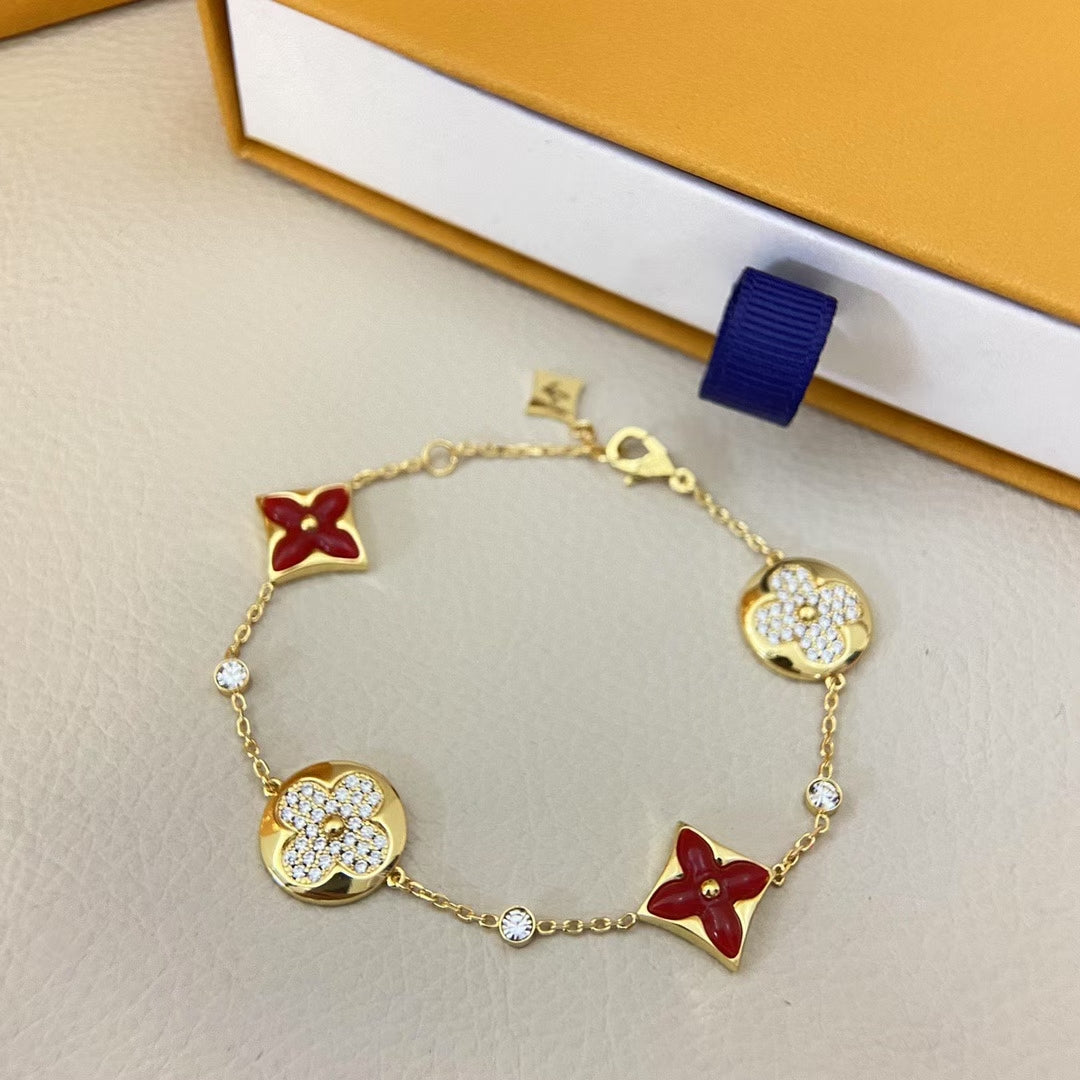 Louis Vuitton Red & Gold Floral Bracelet – Sparkling Stones & Monogram Motifs
