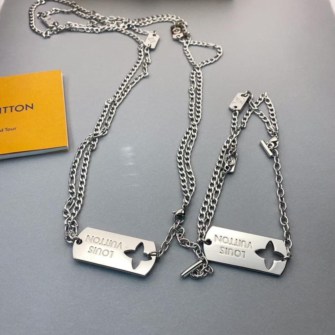 Louis Vuitton Engraved Tag Double Chain Necklace & Bracelet – Silver with Flower Cut-Out