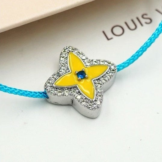 Louis Vuitton Flower Charm Cord Bracelet – Turquoise & Green with LV Logo