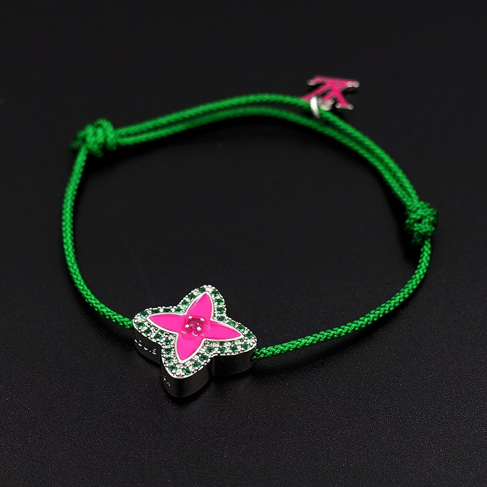 Louis Vuitton Flower Charm Cord Bracelet – Turquoise & Green with LV Logo