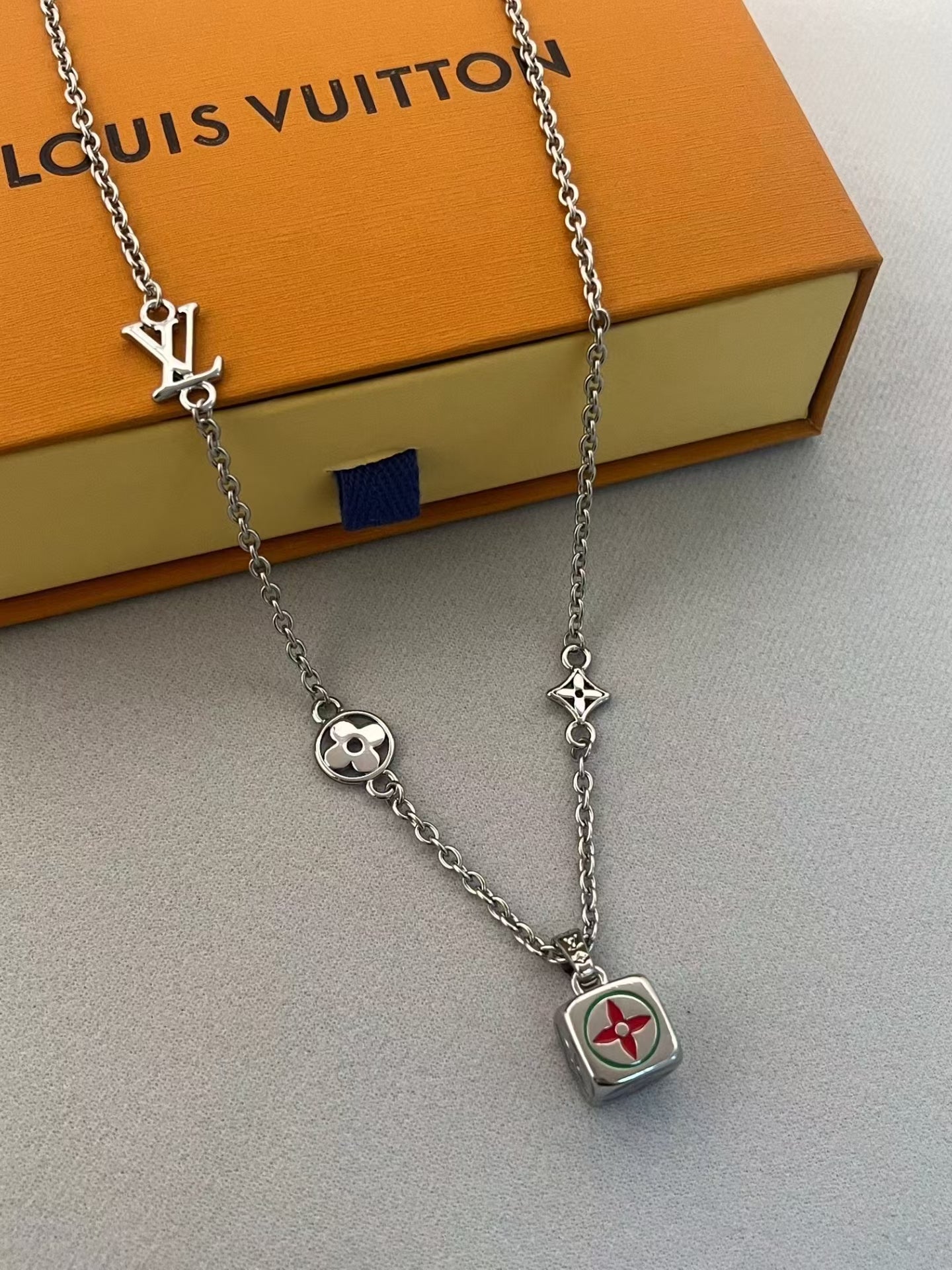Louis Vuitton Charm Cluster Necklace – Silver Chain with LV Cube & Star Motifs