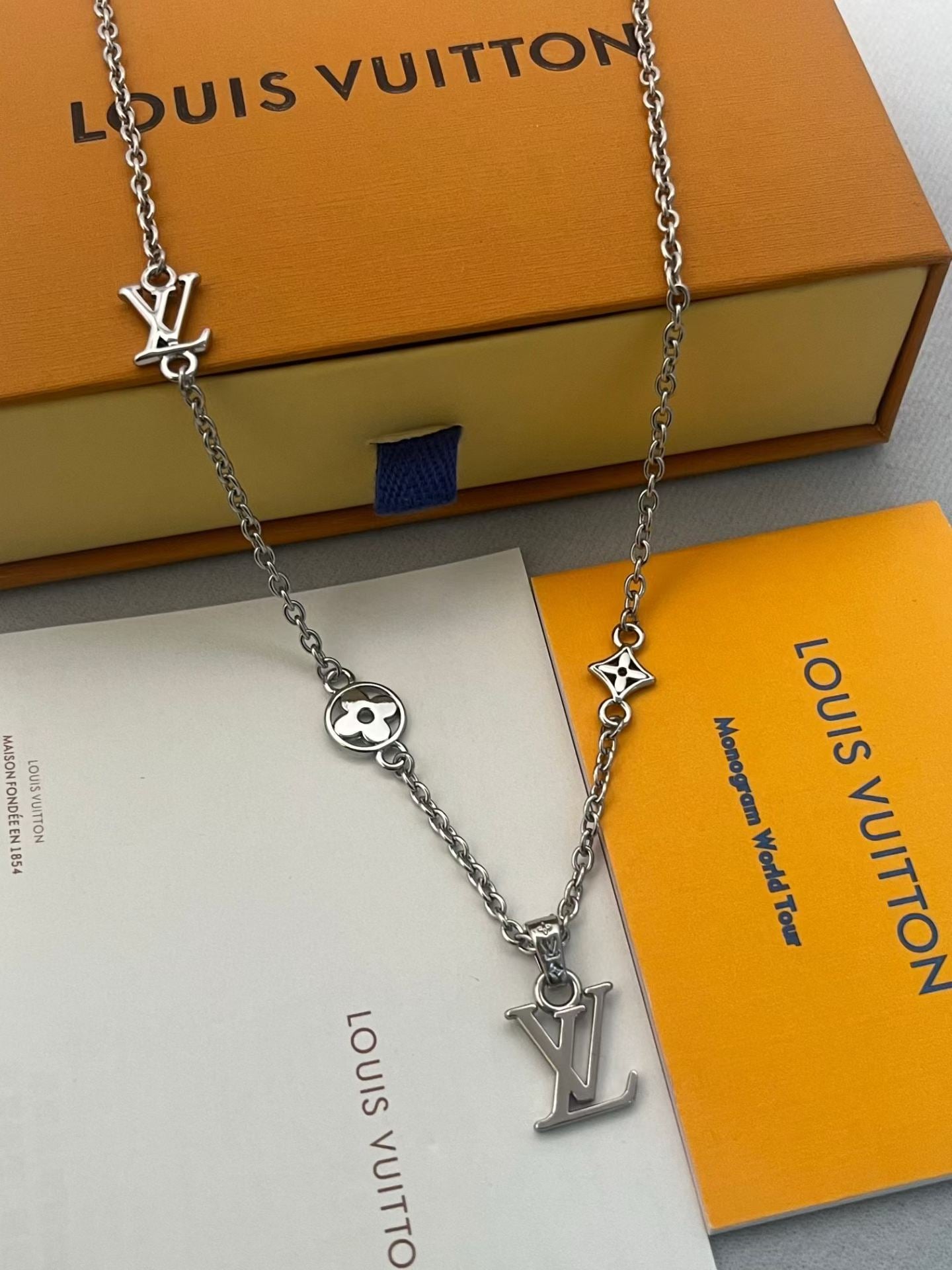 Louis Vuitton Signature Charm Necklace – Silver Chain with LV Logo & Motifs