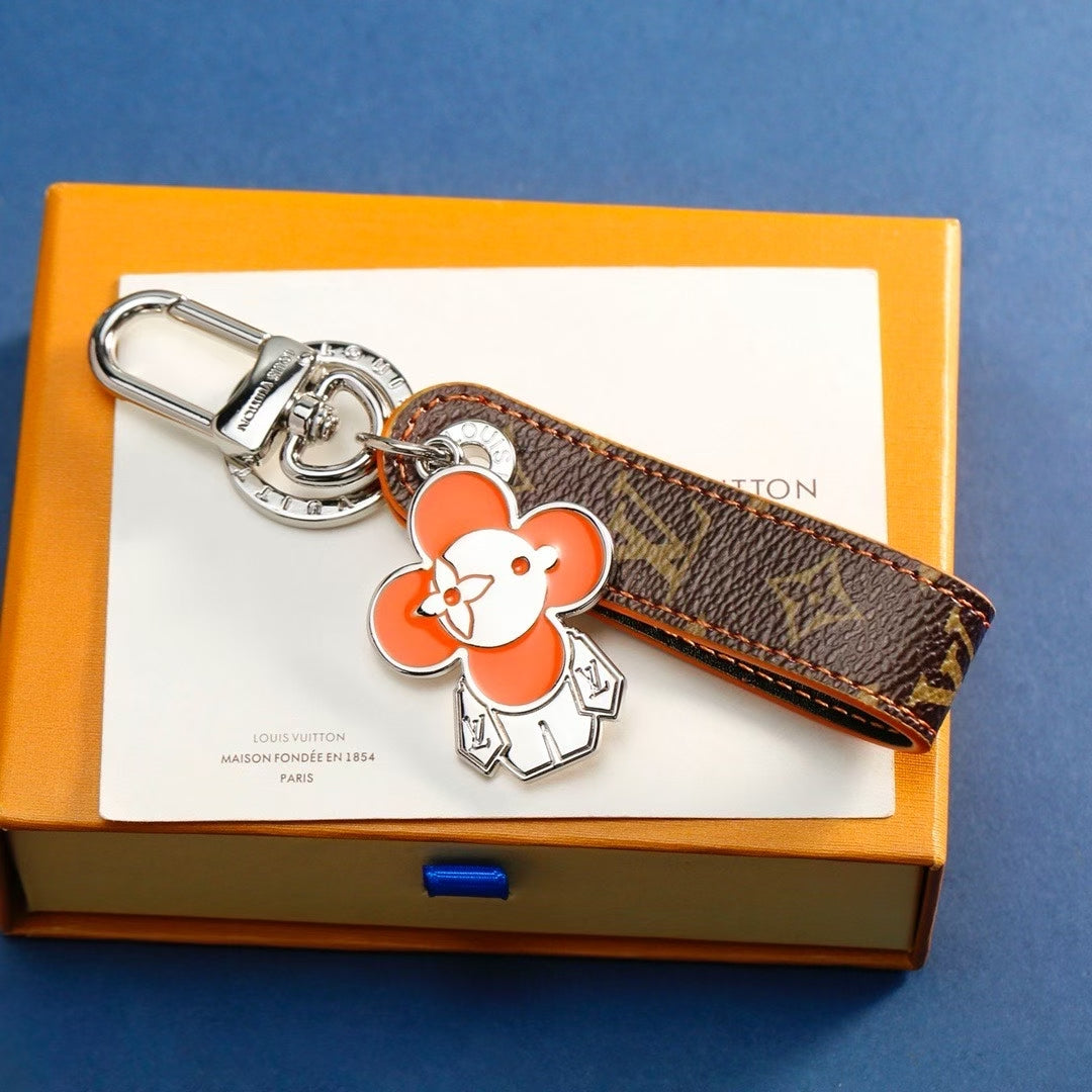 Louis Vuitton Character Keychain – Flower Charm with Monogram Leather Strap