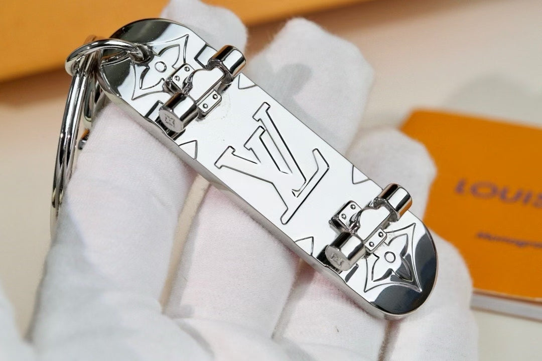 Louis Vuitton Monogram Leather Tag Keychain – Classic Brown & Gold