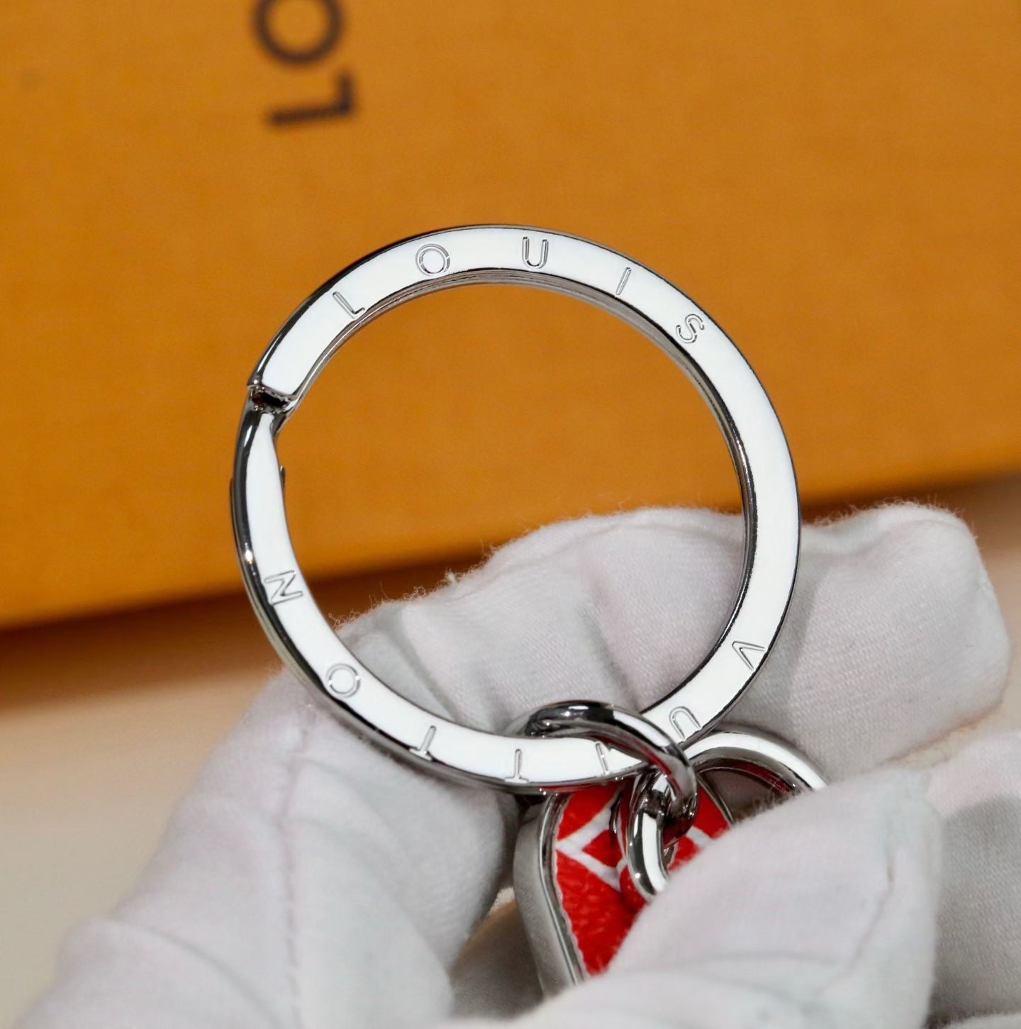 Louis Vuitton Monogram Leather Tag Keychain – Classic Brown & Gold