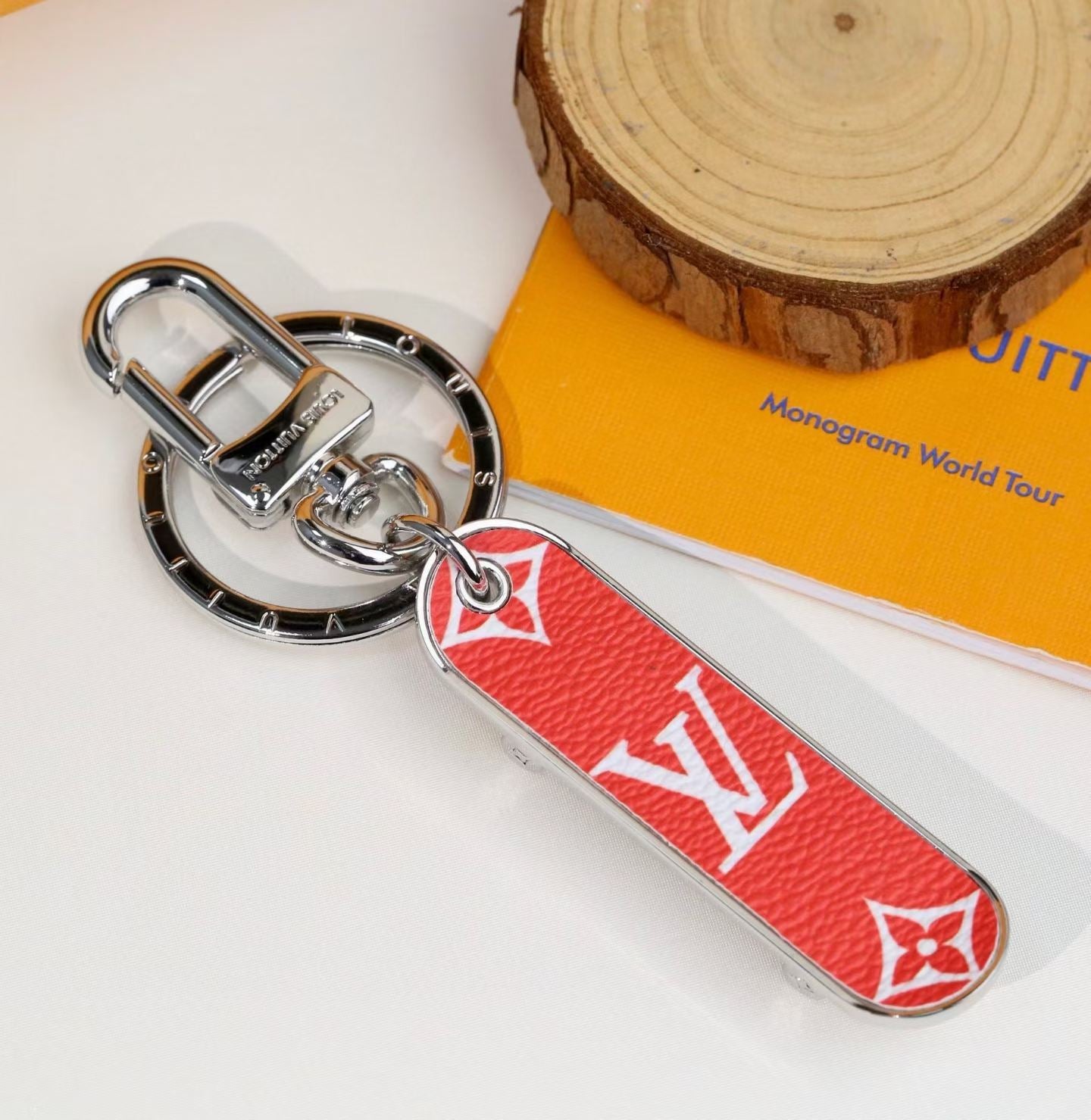 Louis Vuitton Monogram Leather Tag Keychain – Classic Brown & Gold