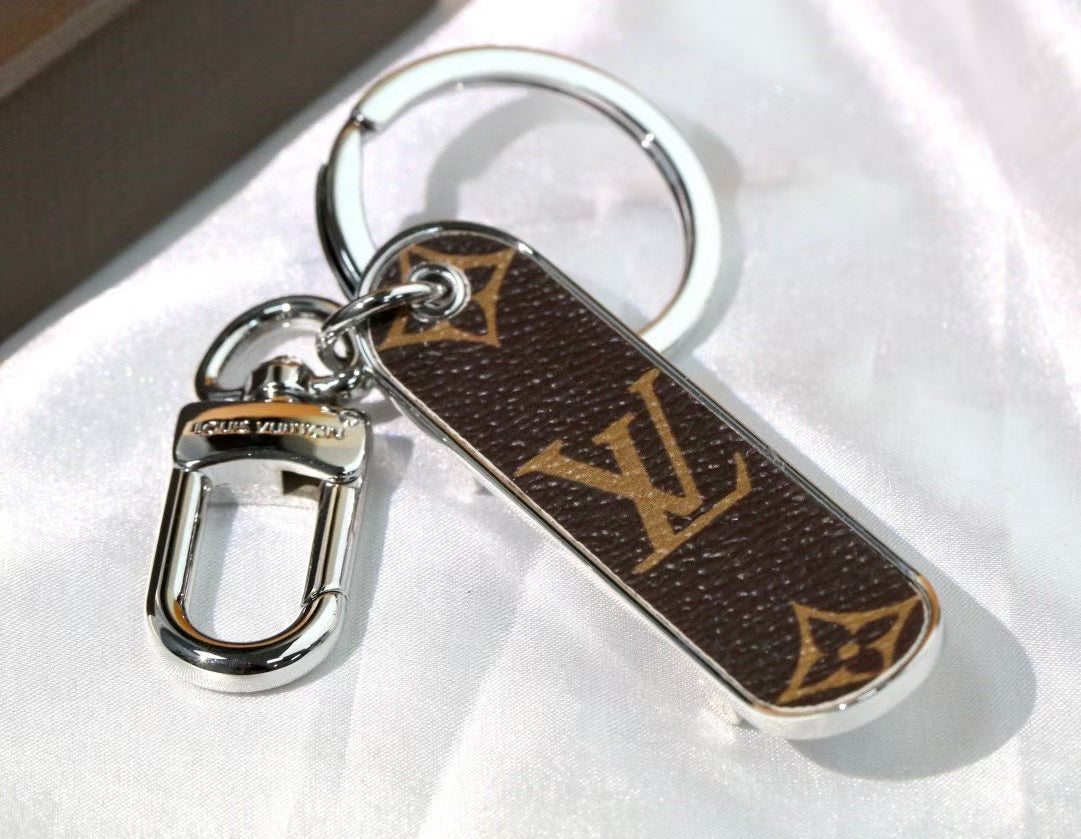 Louis Vuitton Monogram Leather Tag Keychain – Classic Brown & Gold