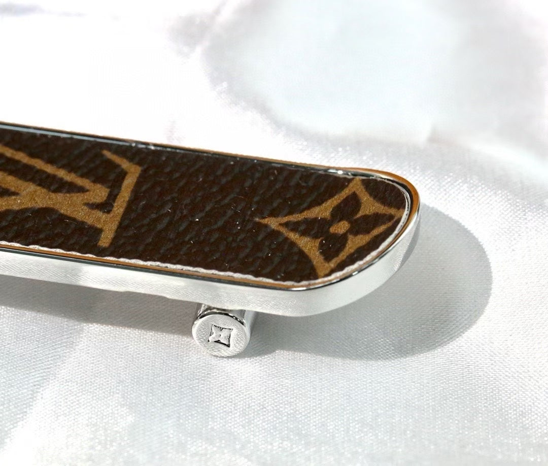 Louis Vuitton Monogram Leather Tag Keychain – Classic Brown & Gold