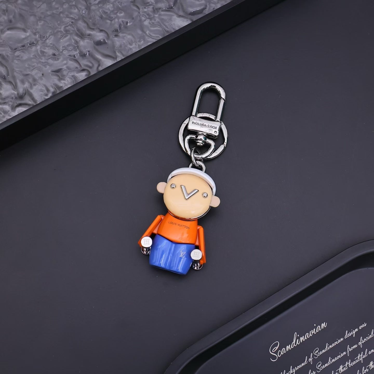 Louis Vuitton Street Style Character Keychain – White Cap, Orange Shirt & Blue Pants