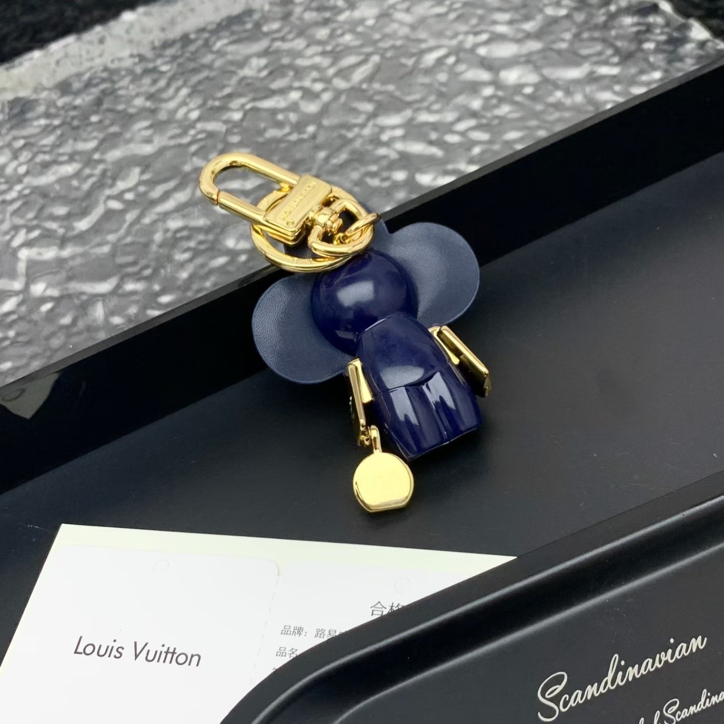 Louis Vuitton Striped Flower Padlock Keychain – Blue & White Petals with Gold Hardware