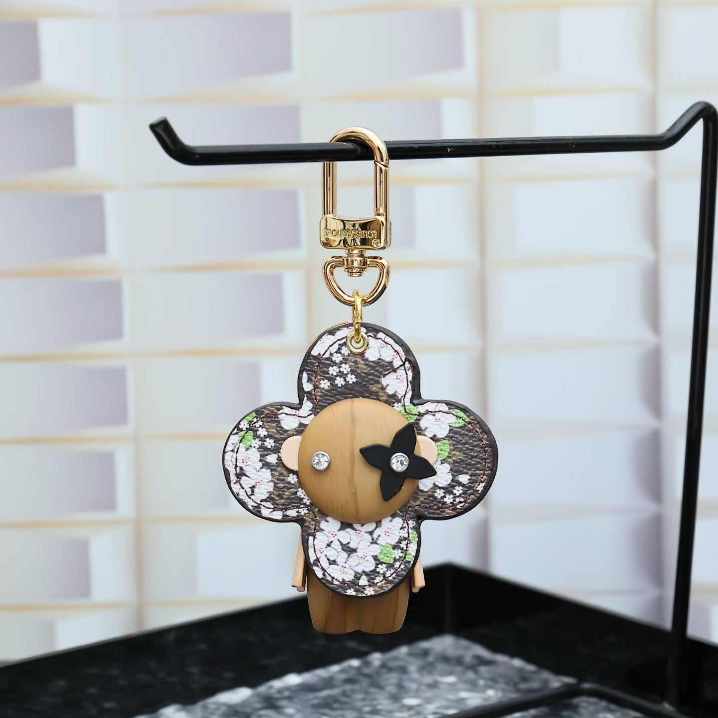 Louis Vuitton Rhinestone Flower Character Keychain – Floral Head & Wooden Face