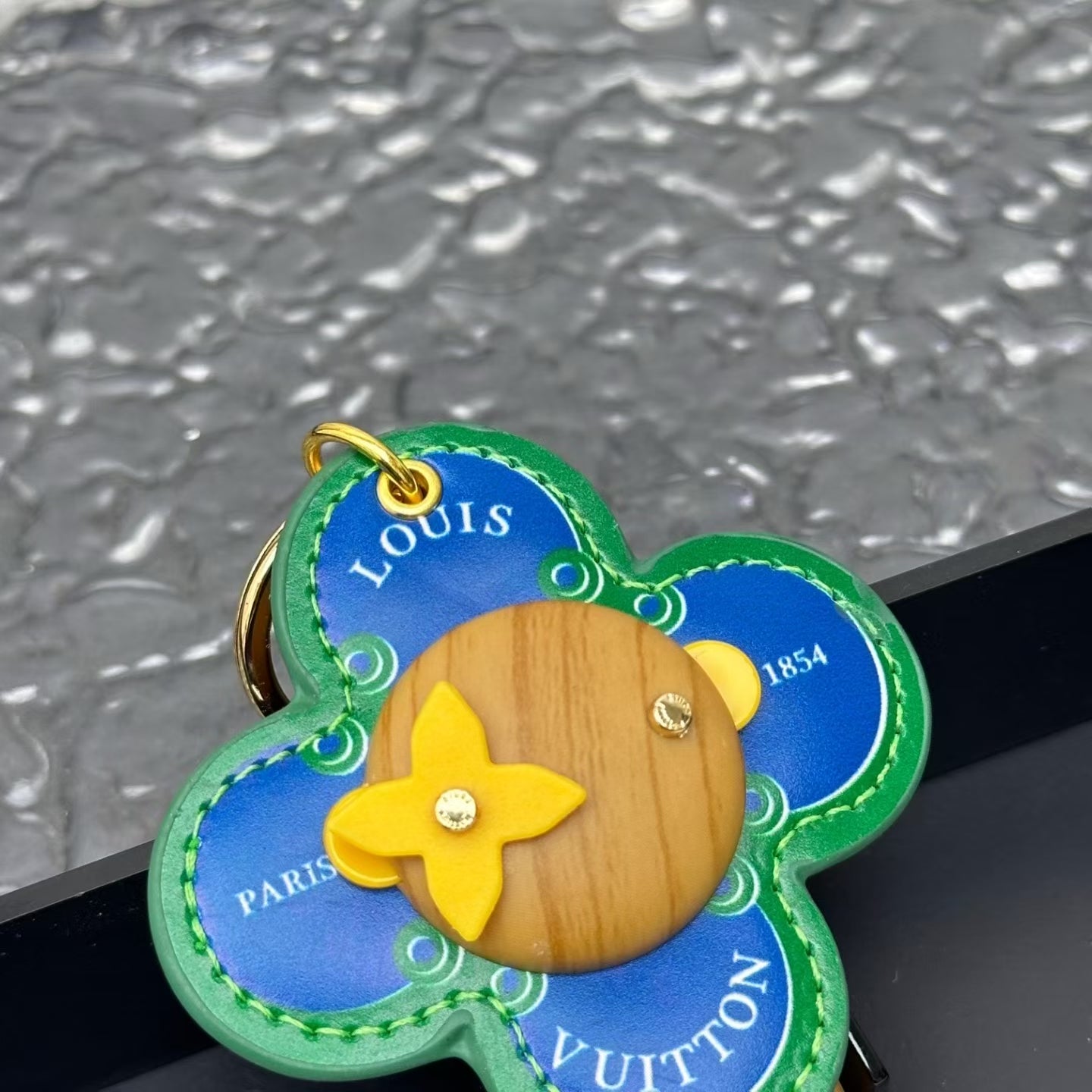 Louis Vuitton “Paris 1854” Blue Flower Keychain – Green Stitching & Yellow Accent
